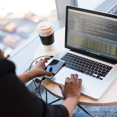 Female Engineer at her computer running Automation software