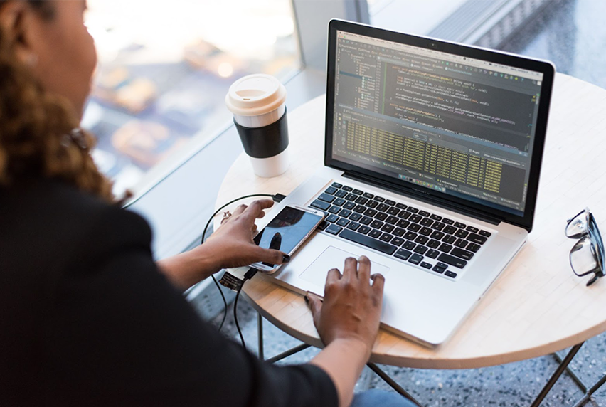 Female Engineer at her computer running Automation software