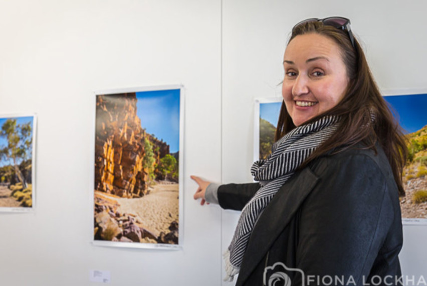 Fiona Lockhart standing with her photography