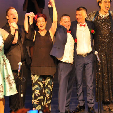 Theatre performers lining up to receive applause