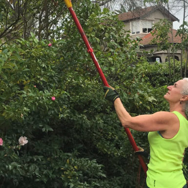 Linda Day caring for garden