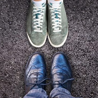 Work-life balance image of business shoes across from casual shoes