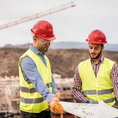 Engineers discussing a plan