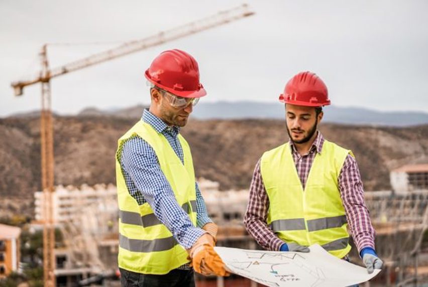 Engineers discussing a plan