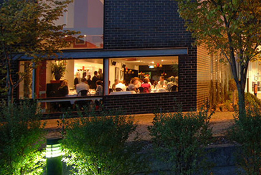 twilight image looking into windows of St. George's Restaurant 