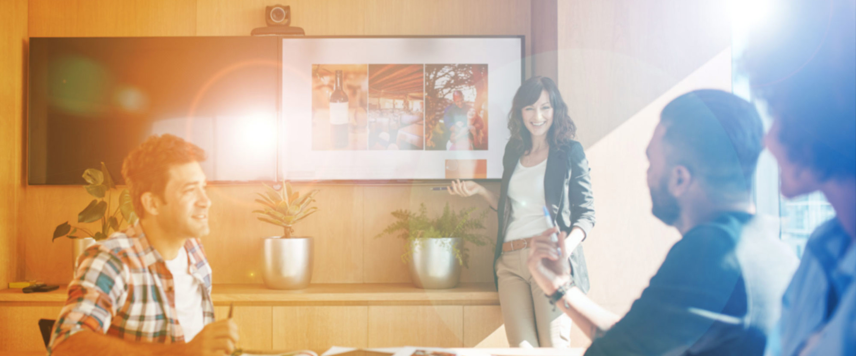 A group of people having a team discussion in an office