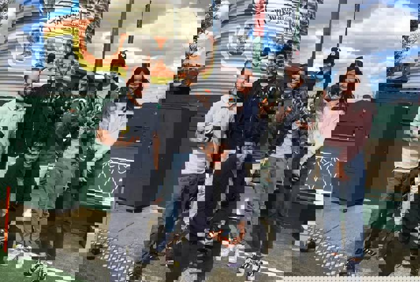 Group of people at lawn bowls