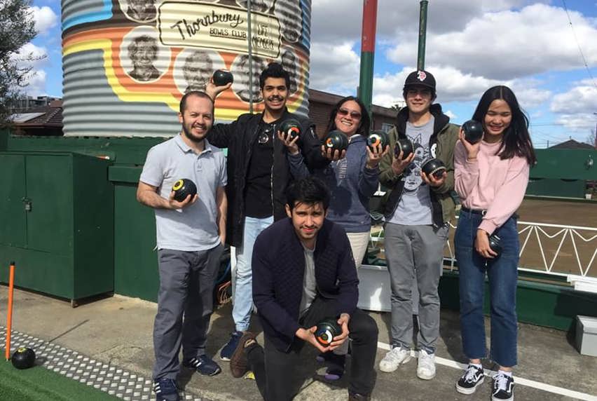 Group of people at lawn bowls