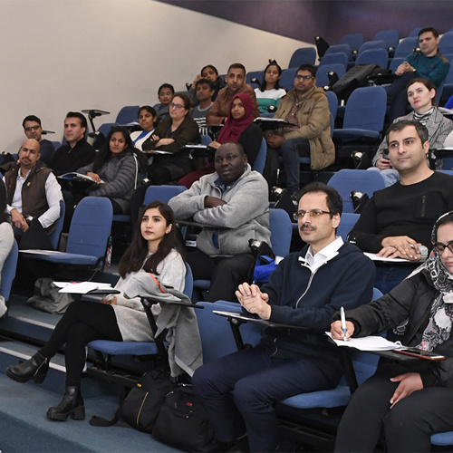 Students listening to a presentation