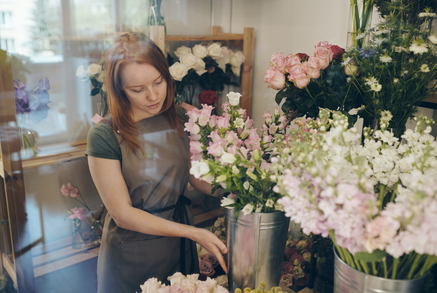 Florist arranging display flowers