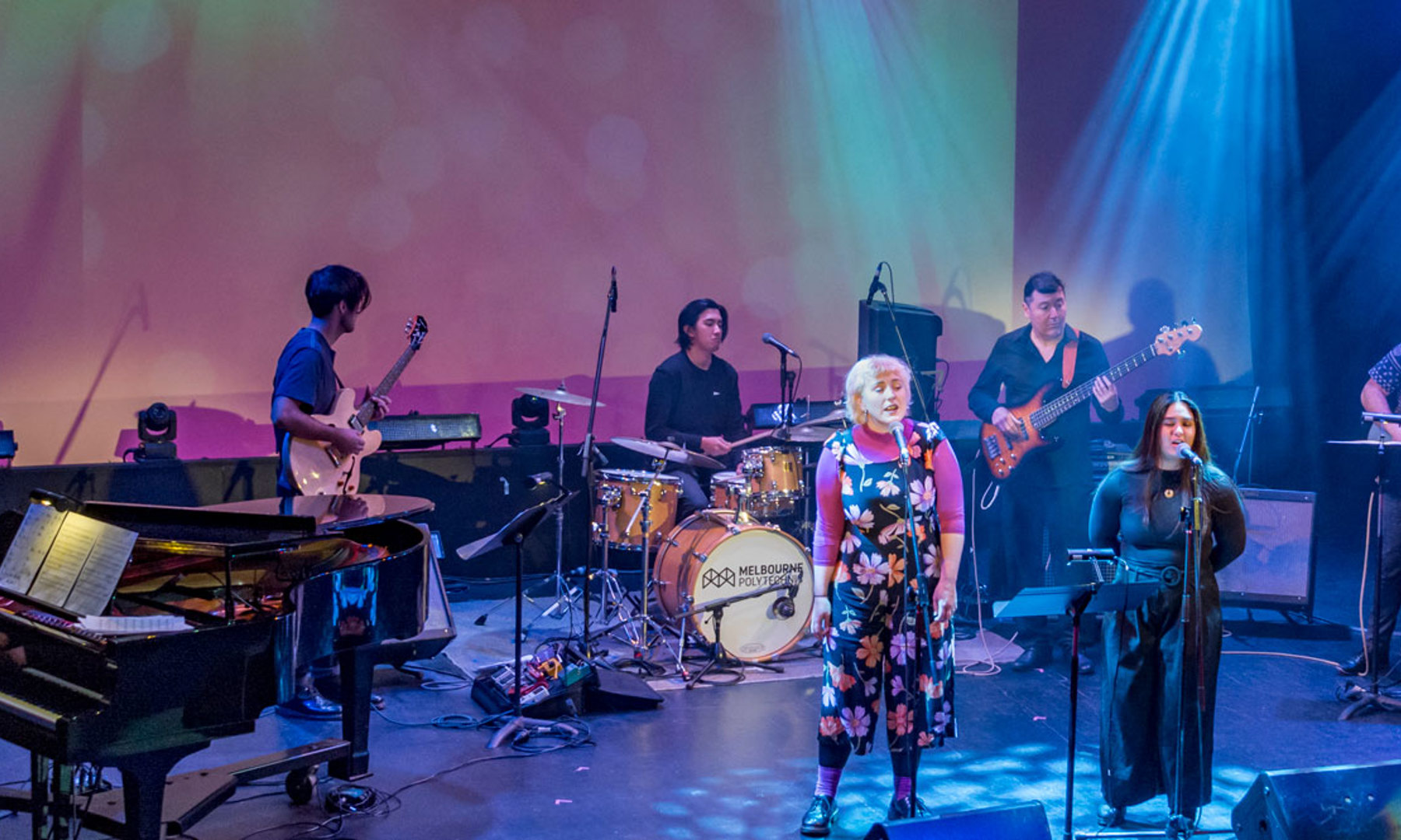 Student singers and musicians performing on stage at Melbourne Polytechnic David Williamson Theatre