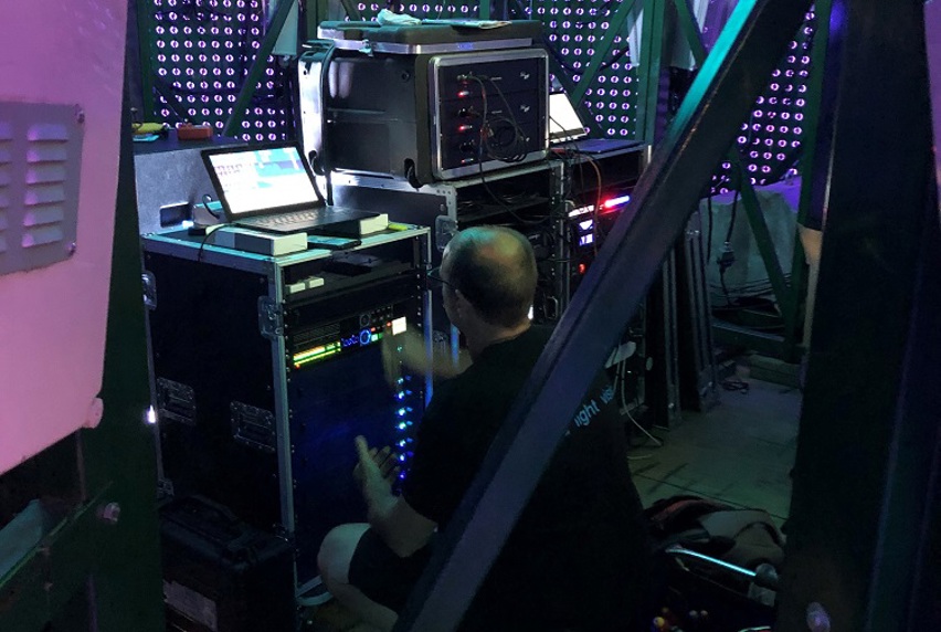 Technician operating the digital Christmas tree