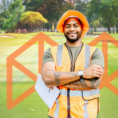 Man wearing hi-visibility vest, standing on a golf course with arms crossed overlaid on top of an orange Melbourne Polytechnic logo.