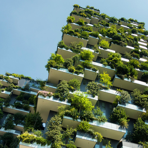 Apartment building decorated with plants