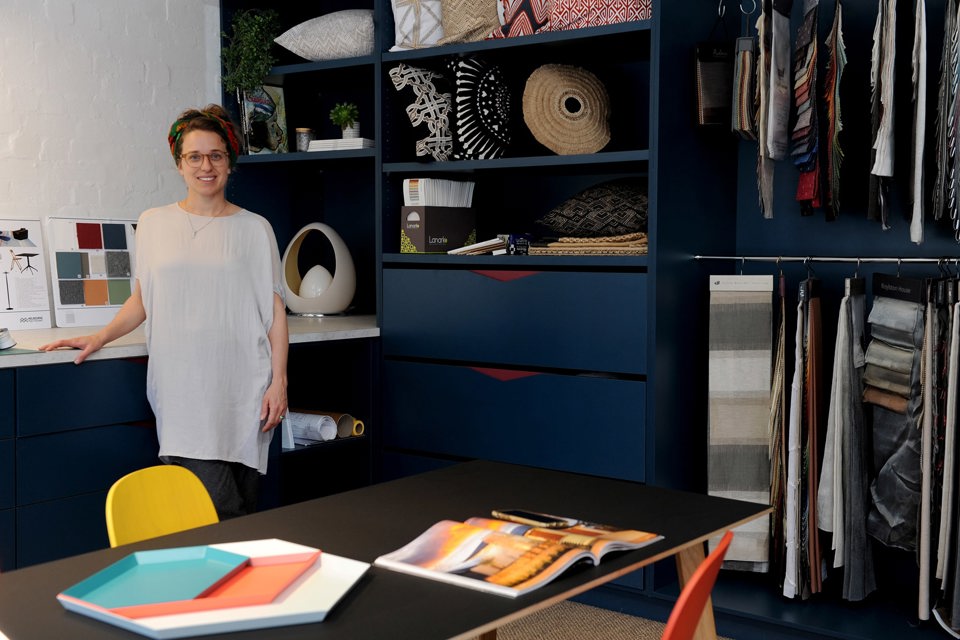 Woman standing in designed office interior