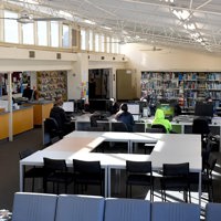 Students working in Melbourne Polytechnic's Heidelberg library