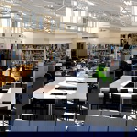 Students working in Melbourne Polytechnic's Heidelberg library