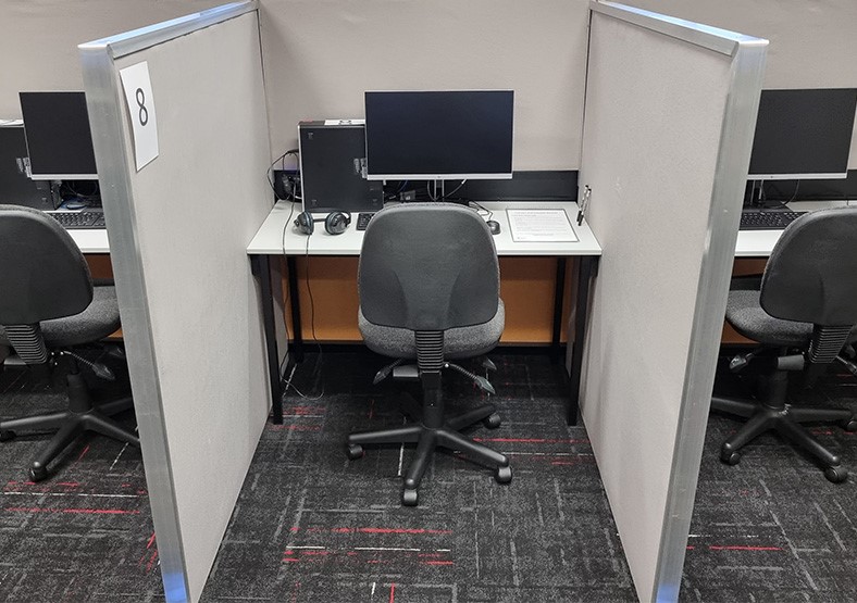 Pearson test centre room 315 cubicle with chair and computer