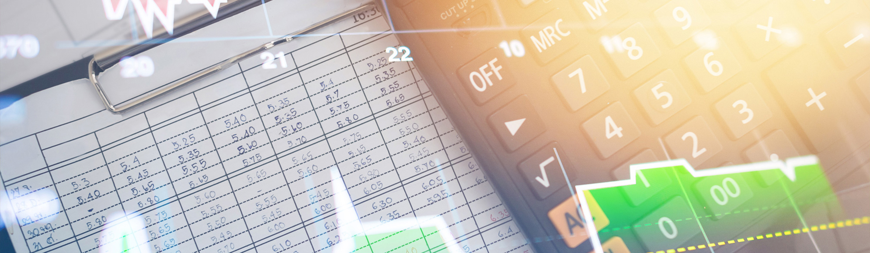 Accounting notebook and calculator with graph overlay