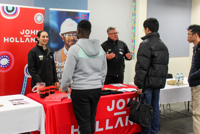 Image of students speaking with employers at industry event