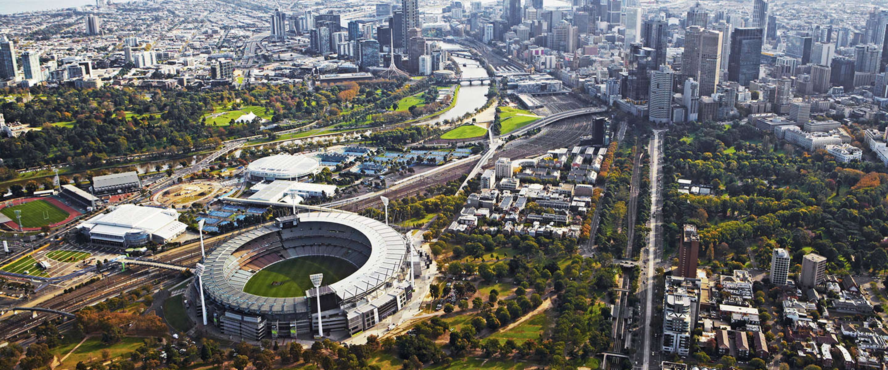 View over Melbourne Cricket Ground, Yarra River and the city of Melbourne at dusk