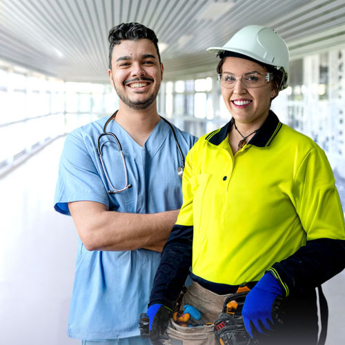 Two people wearing PPE, one in scrubs with a stethoscope and the other in high-vis clothing with a tool belt.