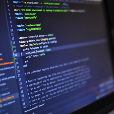 Computer screen with coding software running 