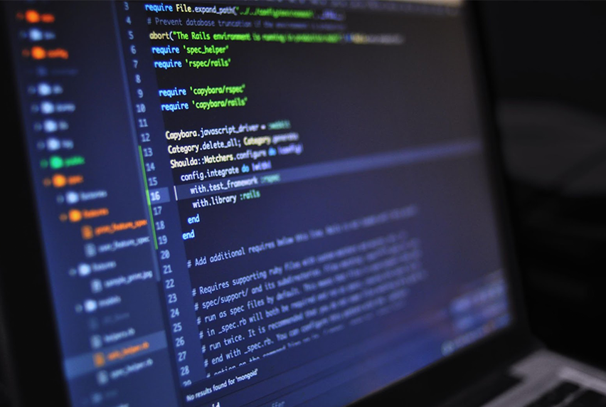 Computer screen with coding software running