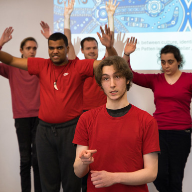 Work Education students wearing red t-shirts.