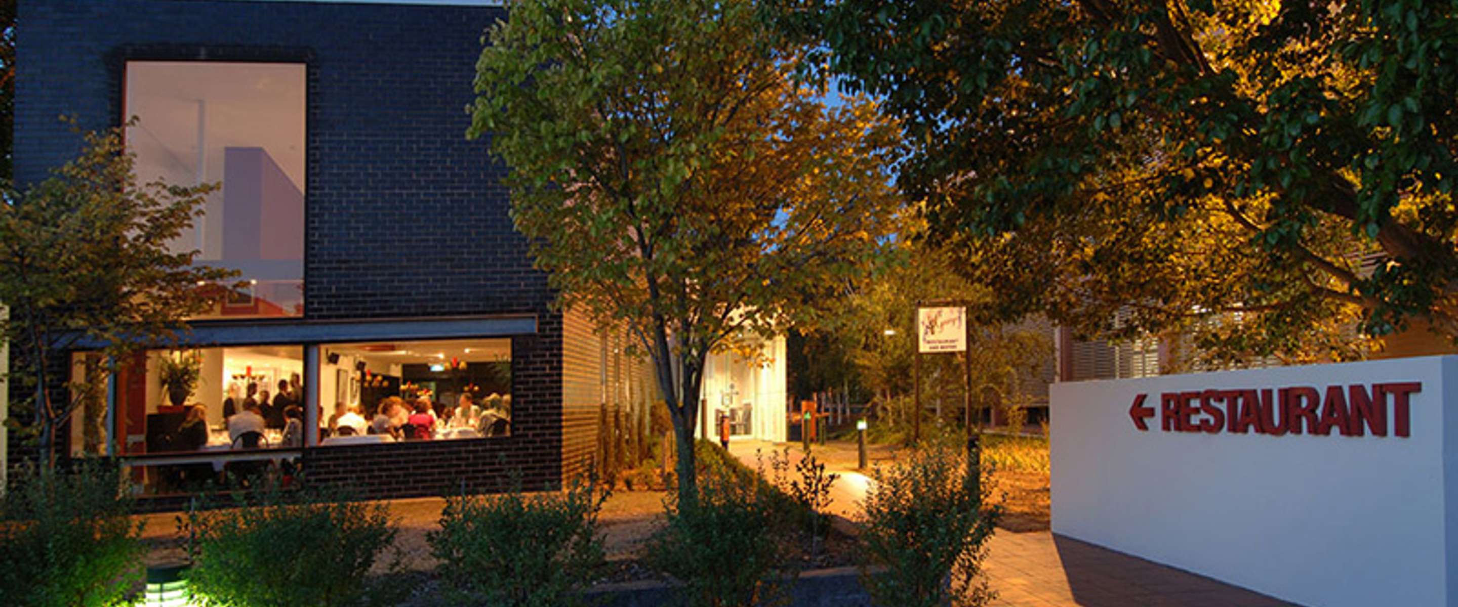 Image of outside St George's restaurant at Preston Campus at dusk