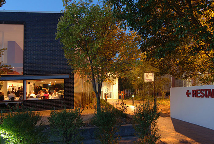 Image of outside St George's restaurant at Preston Campus at dusk
